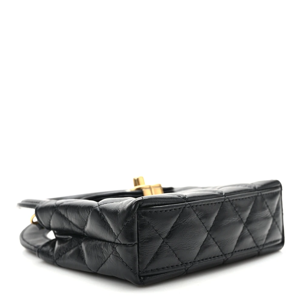 Bottom view of the black aged calfskin Nano Kelly Shopper showing the structured leather base