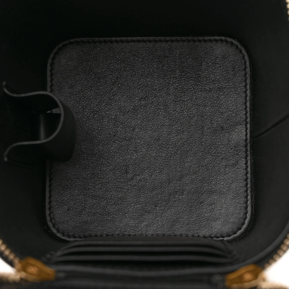 Interior view of the black caviar leather Small Coco Beauty Vanity Case with leather lining and organized storage