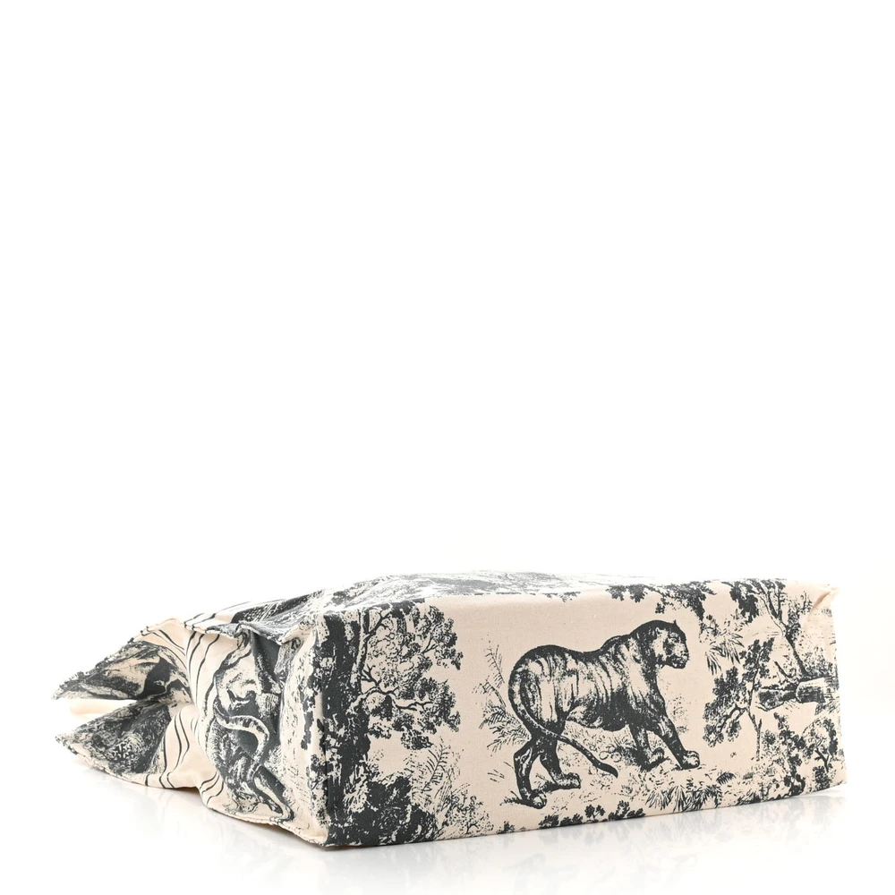 Bottom view of the Medium Dioriviera Tote showing the embroidered canvas base