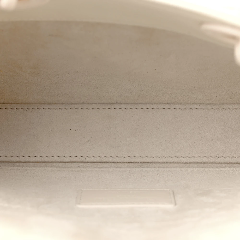 Interior view of the Medium Lady D-Joy bag with leather lining and spacious storage compartment