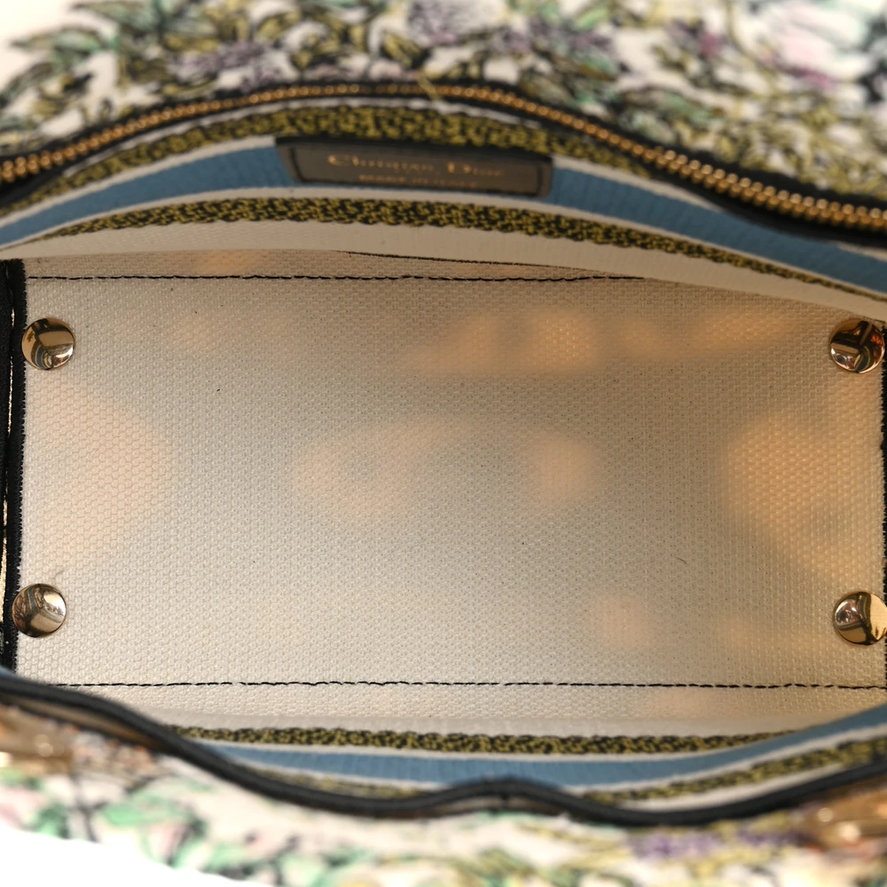 Interior view of the Medium Lady D-Lite bag with canvas lining and spacious storage compartment