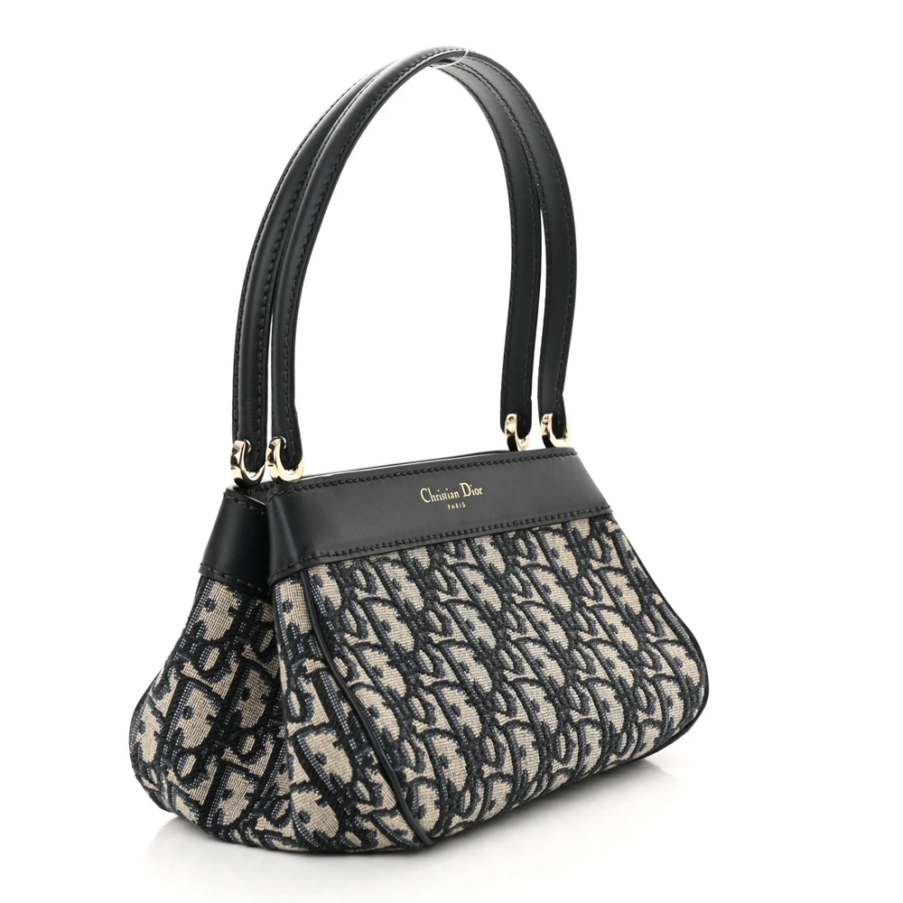 D!0rBlue Oblique canvas Medium Key Bag with top handle and detachable shoulder strap side view
