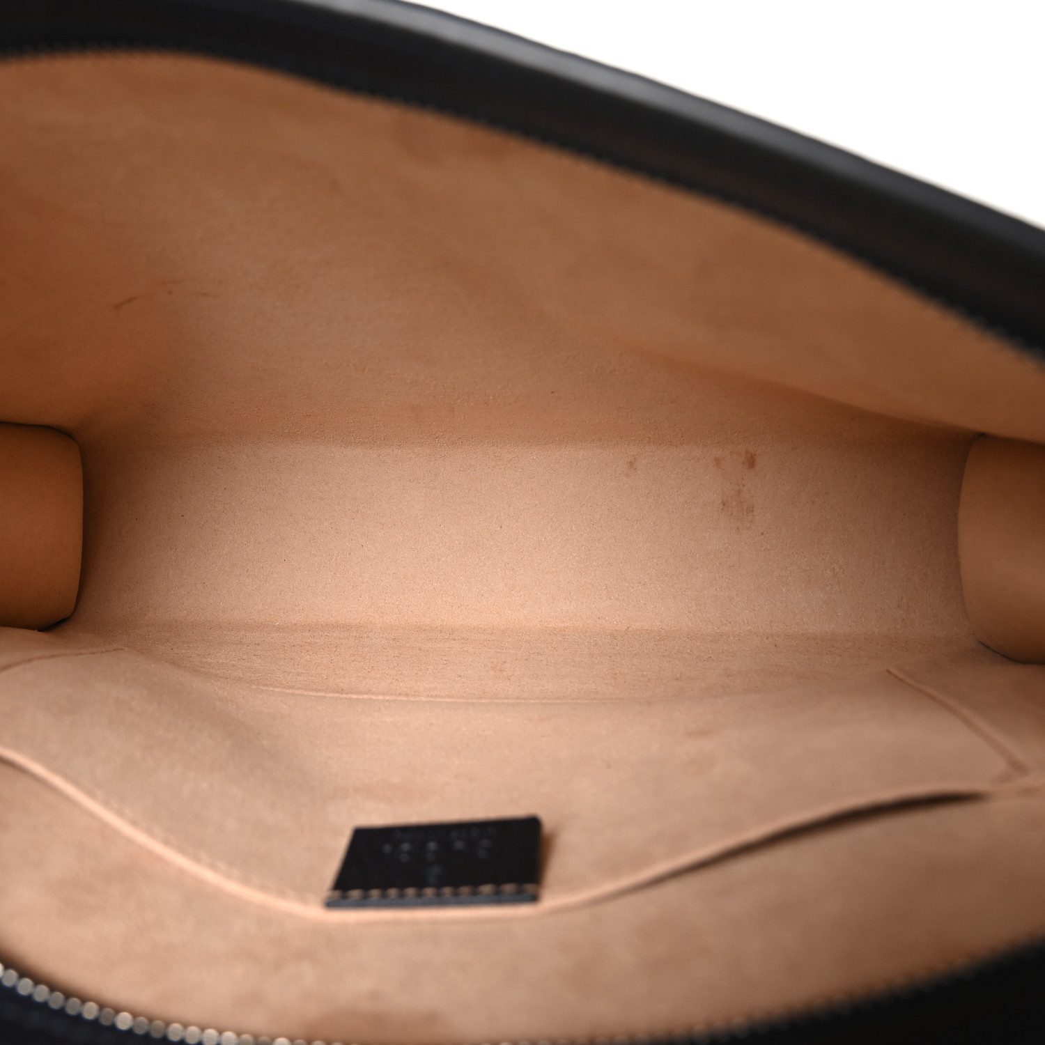 Interior view of the GG Supreme Monogram Web Ophidia Pouch with spacious fabric-lined compartment