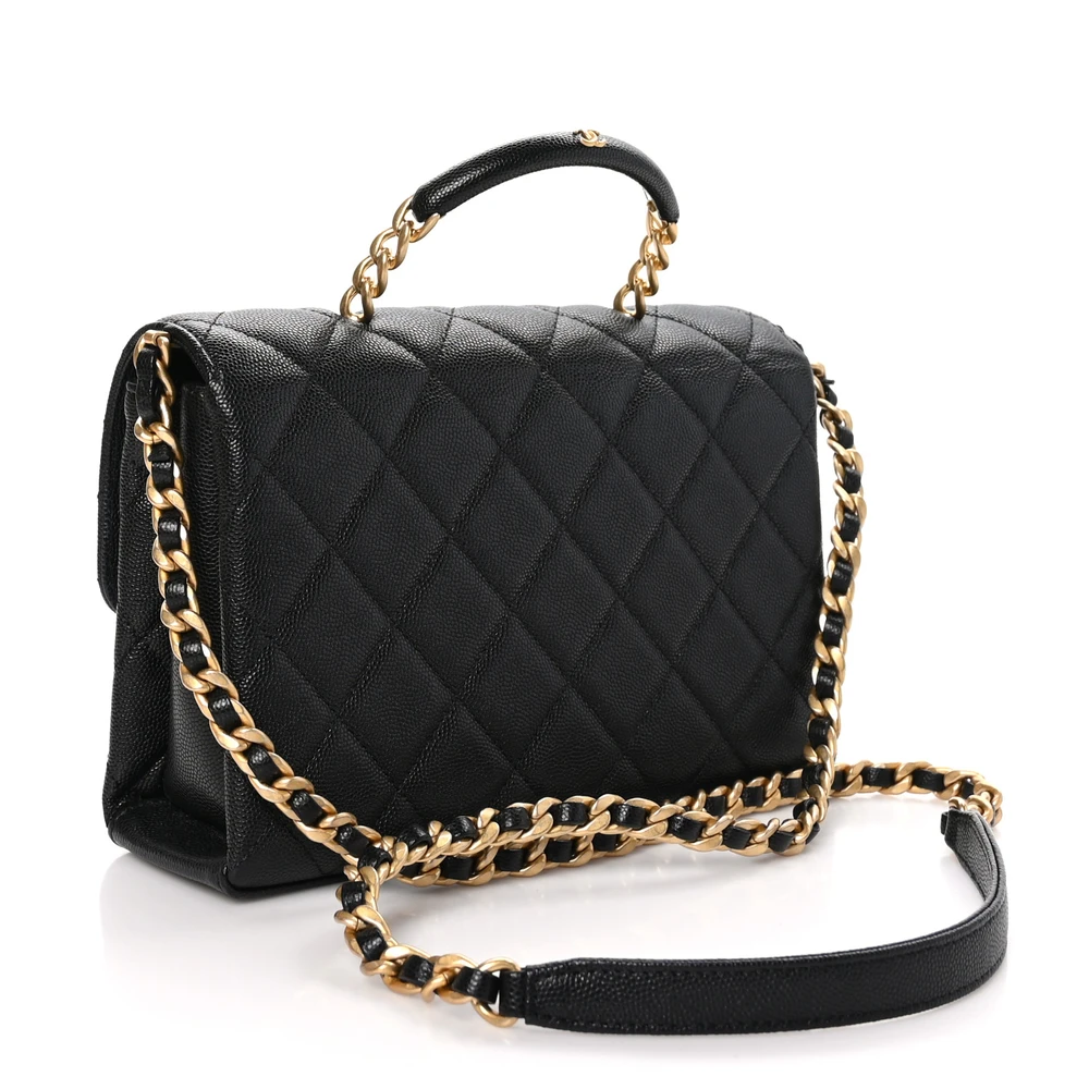 Back view of the black caviar leather Ch@nel Medium Carry Me Flap with elegant top handle