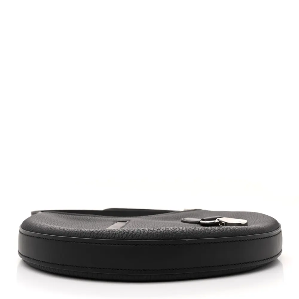 Bottom view of the Herme$ Black Togo and Swift Leather P’tit Arçon showing the leather base