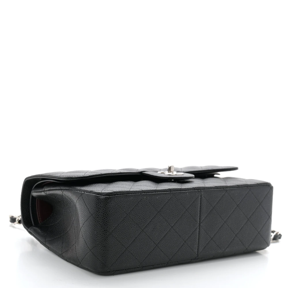 Bottom view of the black caviar leather Jumbo Double Flap with silver chain straps