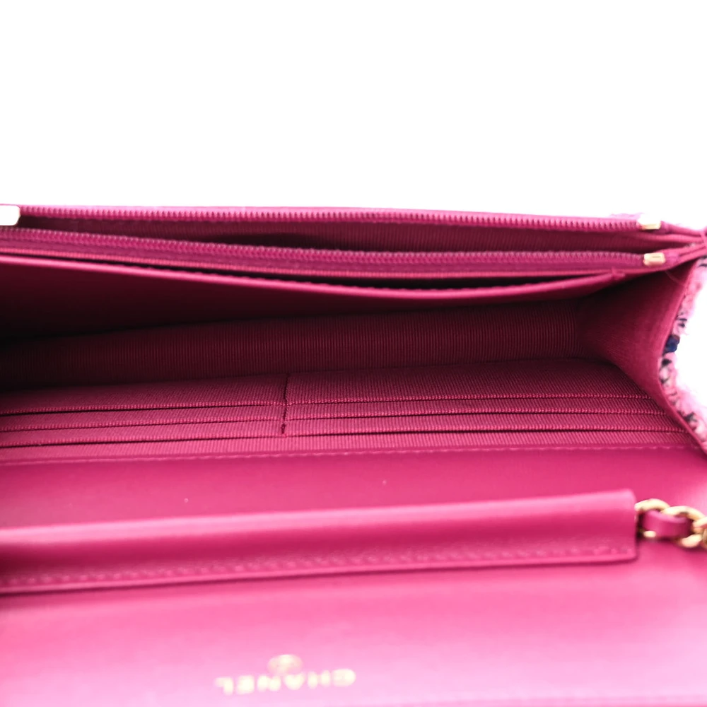 Interior view of the fuchsia and purple tweed Wallet On Chain with card slots and organized storage compartment