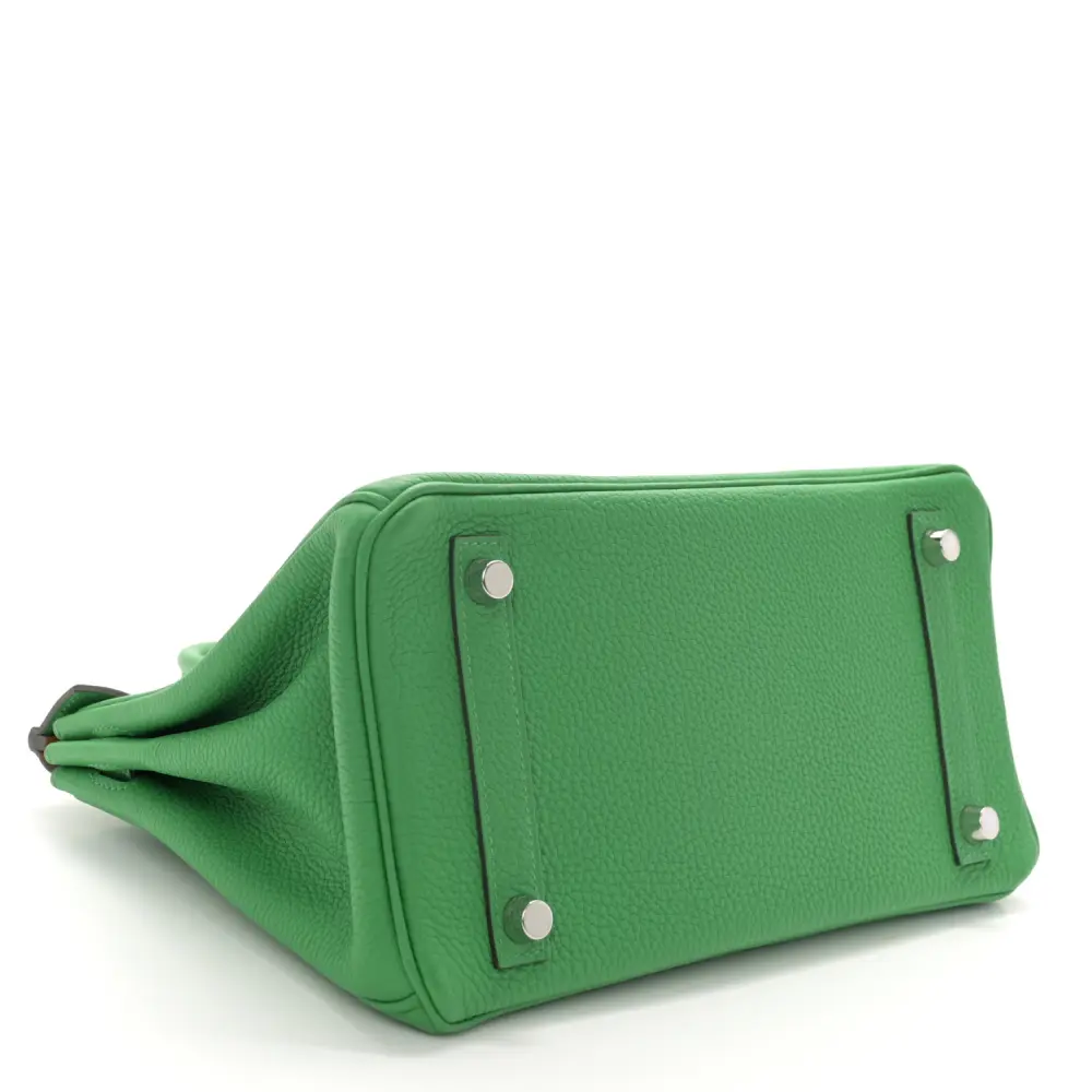 Bottom view of the Herme$ Verso Birkin 25 showing protective metal feet