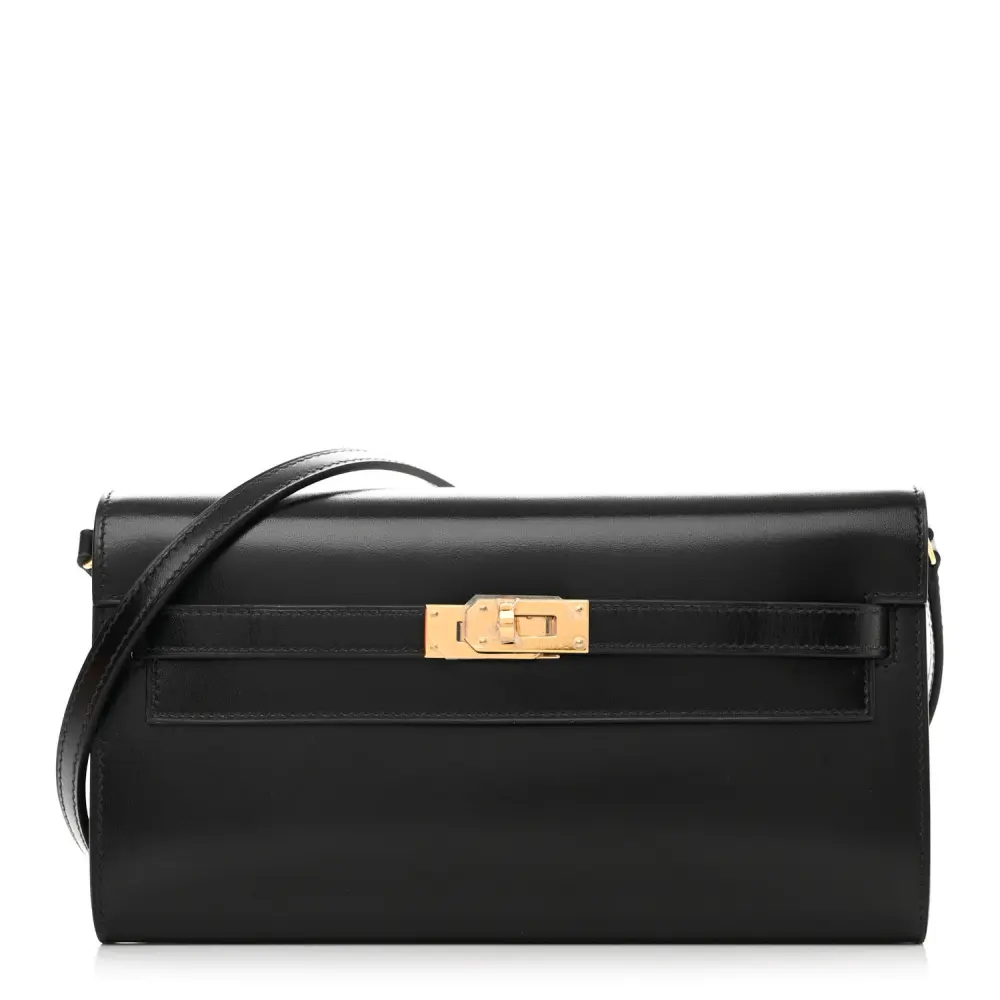 Front view of the Herme$ Black Box Leather Kelly Wallet To Go with gold hardware
