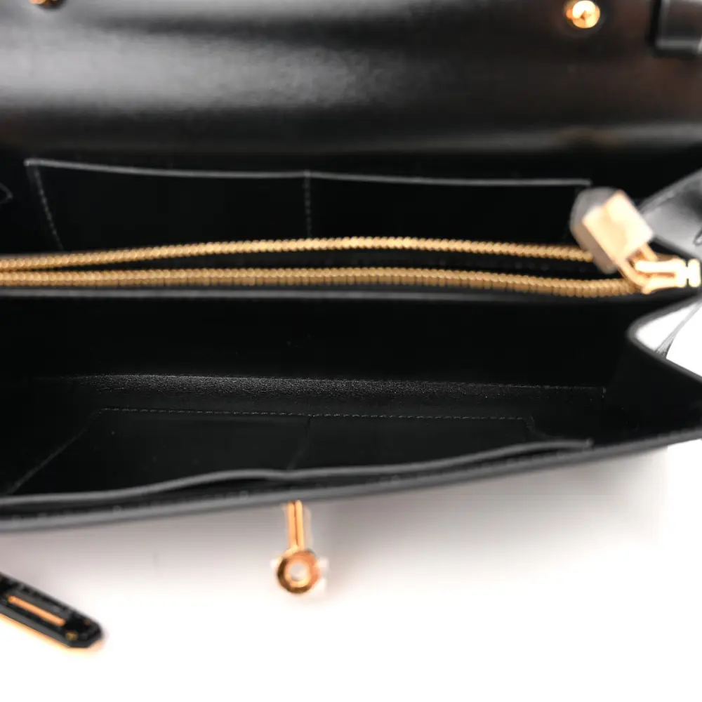 Interior view of the Herme$ Black Box Leather Kelly Wallet To Go with card slots and zip pocket