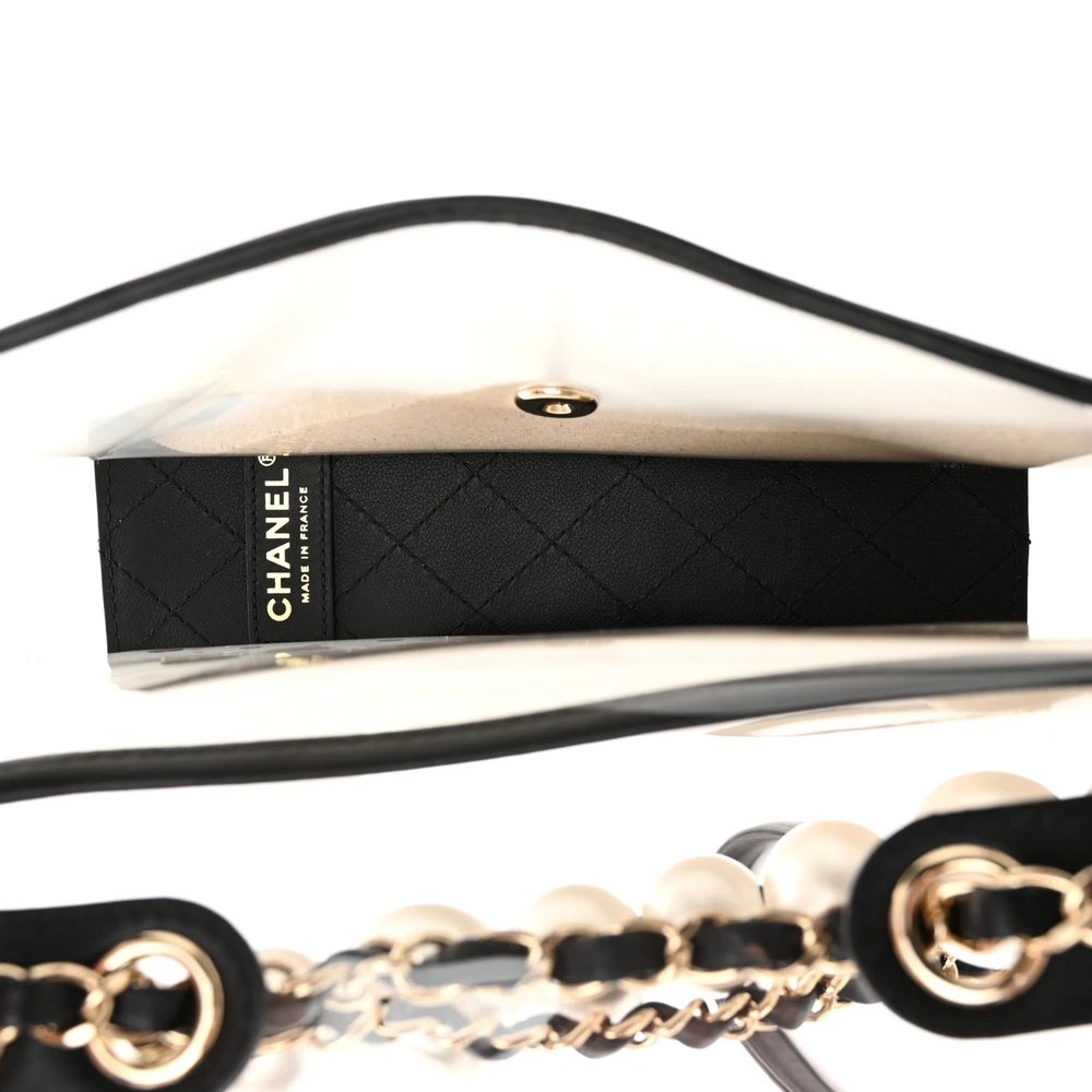 Interior view of the black PVC Sand By The Sea Flap with organized storage compartment