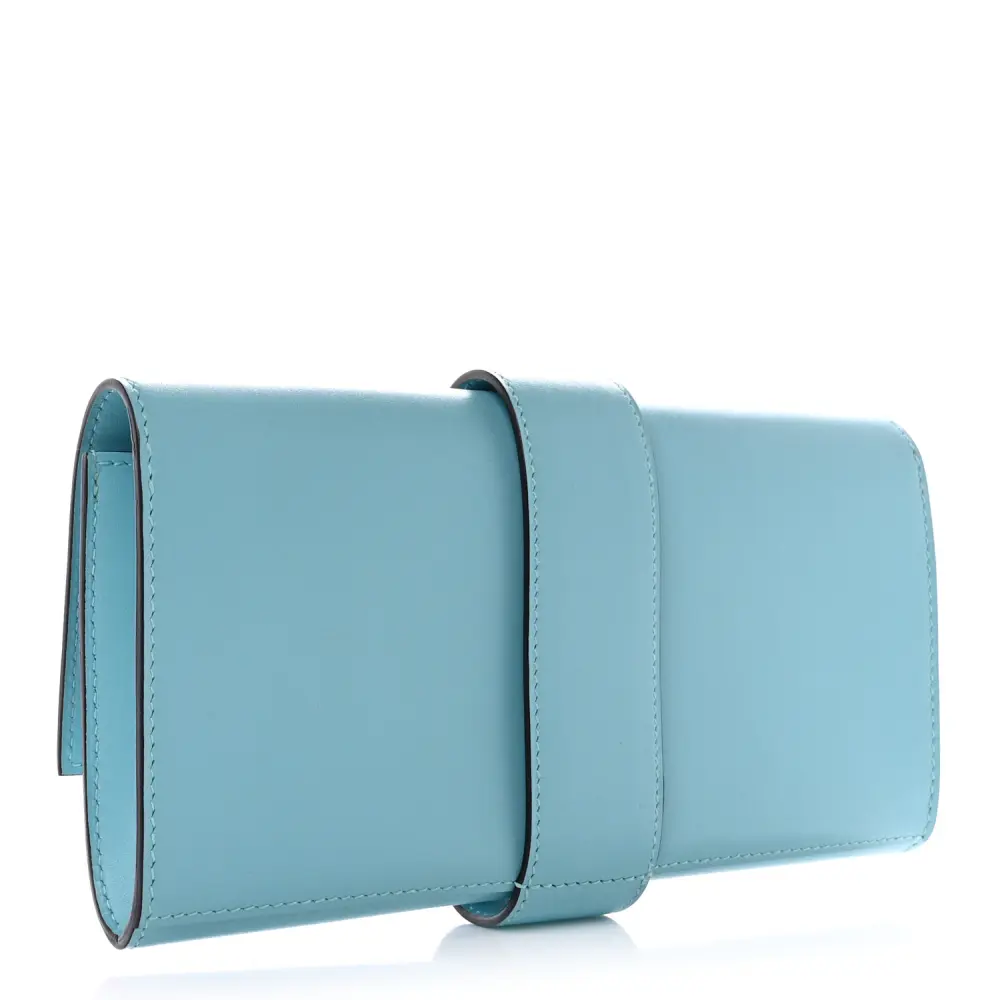Back view of the Herme$ Tadelakt Medor 23 Clutch Bleu Atoll Leather