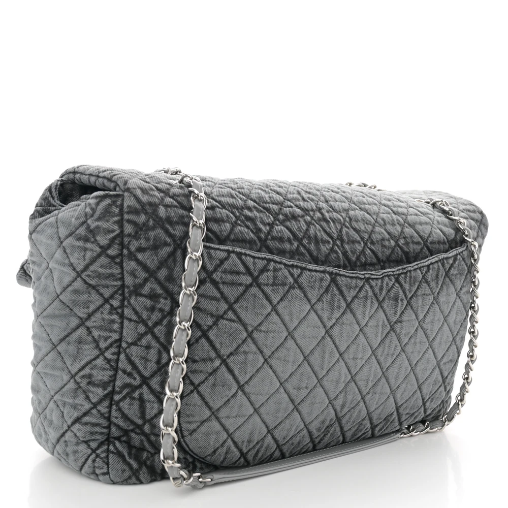 Back view of the quilted grey and black Denimpression XXL Flap with silver chain straps
