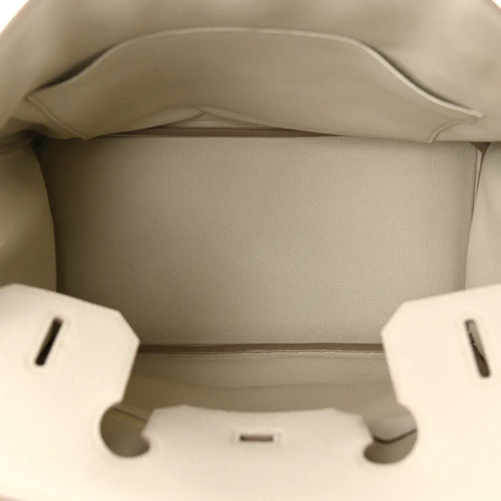 Interior view of the Herme$ Togo Leather Birkin 30 with leather lining, zip pocket, and slip pocket