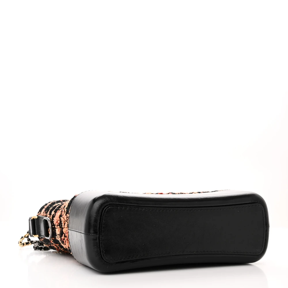 Bottom view of the black and brown tweed Medium Gabrielle Hobo with gradient metal chain strap