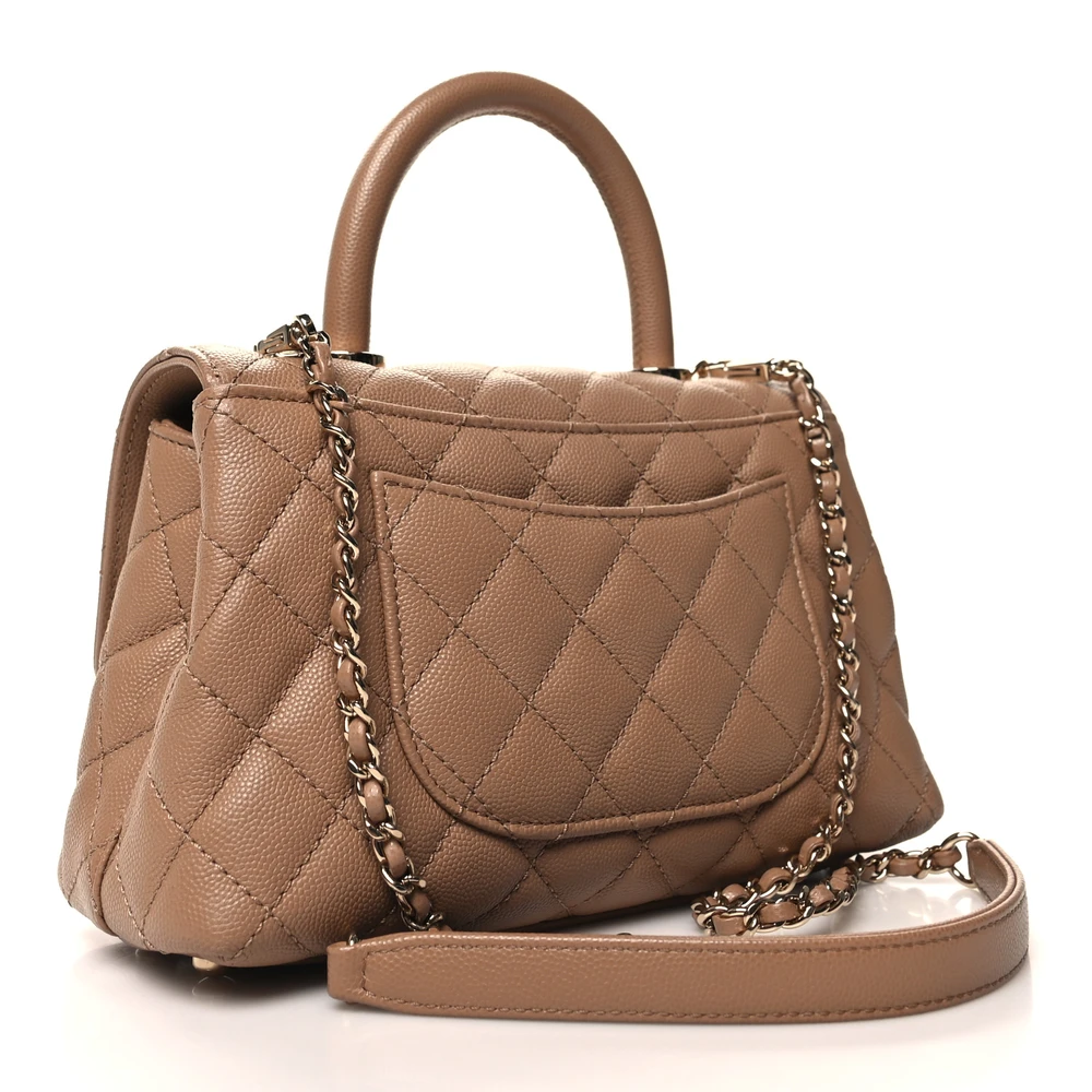 Back view of the brown caviar leather Mini Coco Handle Flap with gold chain strap