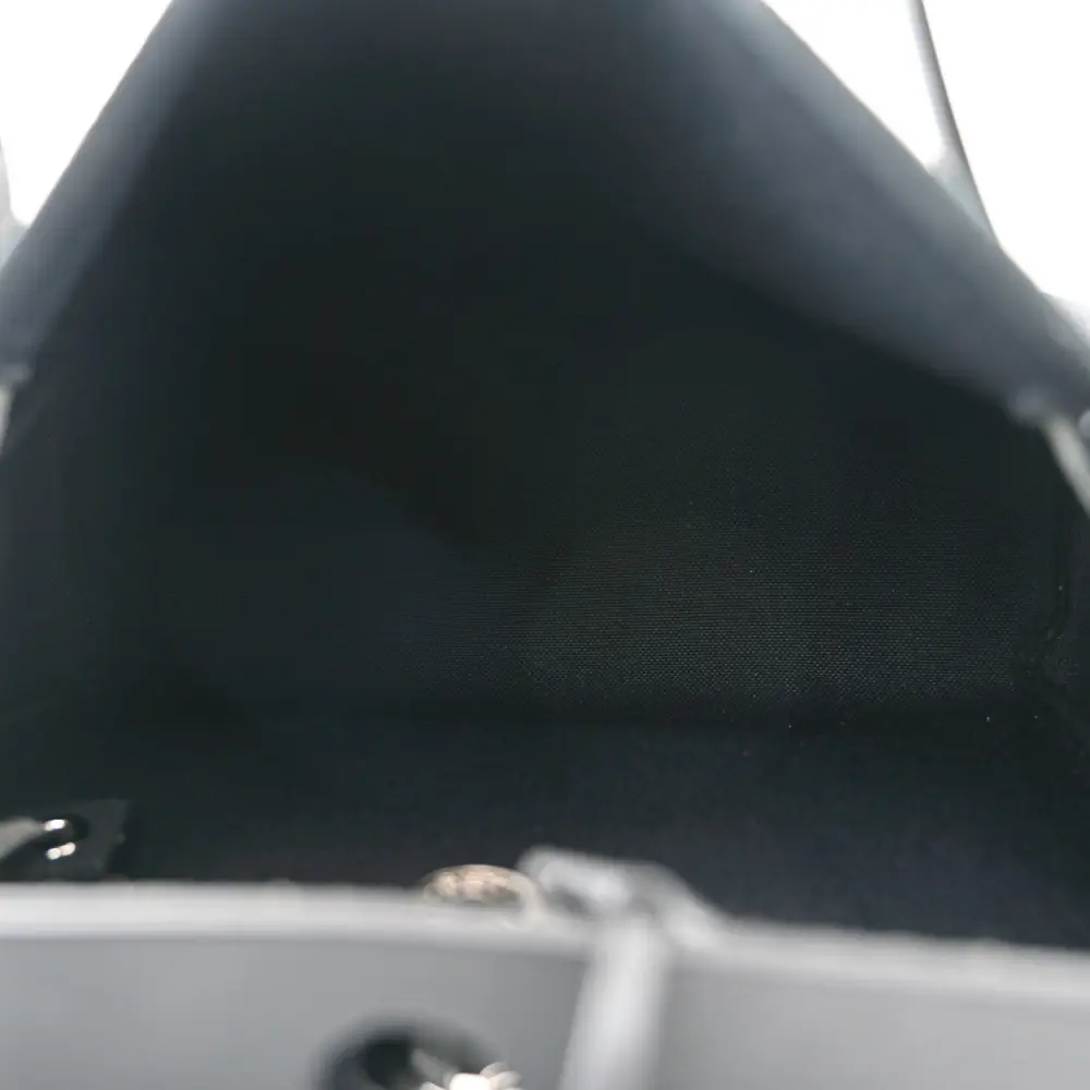 Interior view of the Herme$ Military Toile Vache Hunter Herbag Zip PM 31 with canvas-lined interior