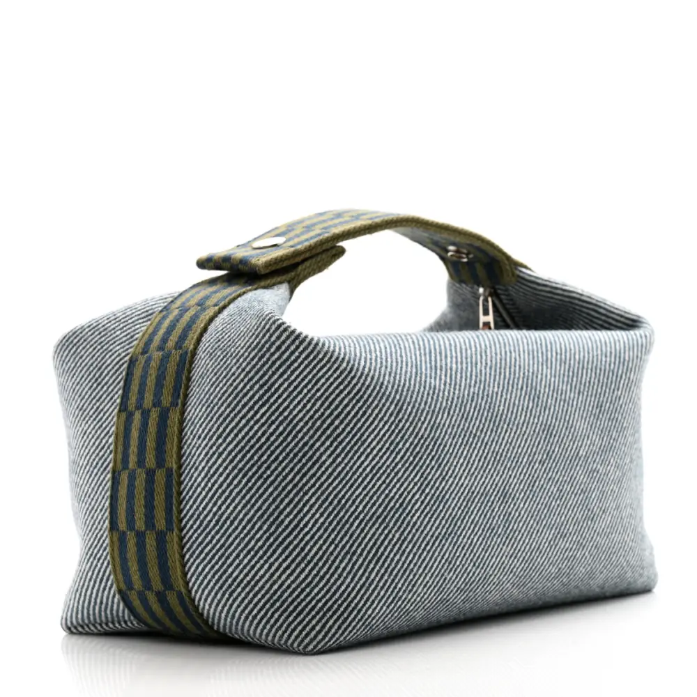 Back view of the Herme$ Bride-à-Brac H Natte Bleu Abysse Wool Large Pouch