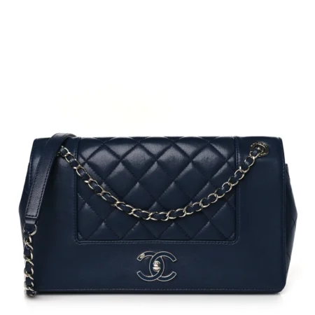 Front view of the dark navy sheepskin Vintage Mademoiselle Flap with blue enamel CC turn lock