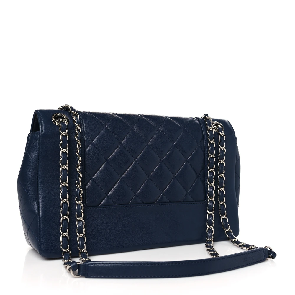 Back view of the dark navy sheepskin Vintage Mademoiselle Flap with blue enamel CC turn lock