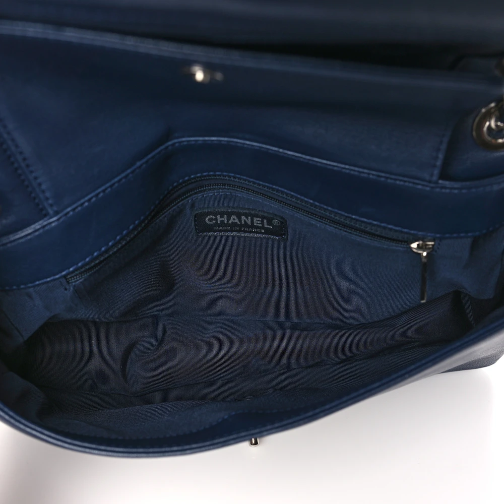 Interior view of the dark navy sheepskin Vintage Mademoiselle Flap with organized storage compartments
