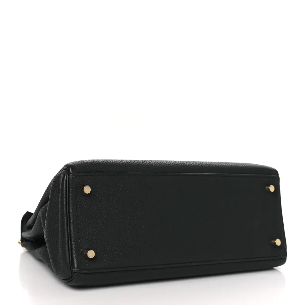 Bottom view of the Herme$ Kelly Retourne 28 Black Togo Leather with gold hardware