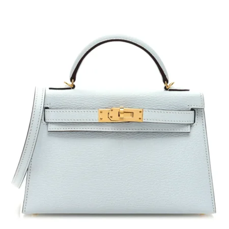Front view of the Herme$ Bleu Brume Chèvre Mysore Leather Mini Kelly Sellier 20