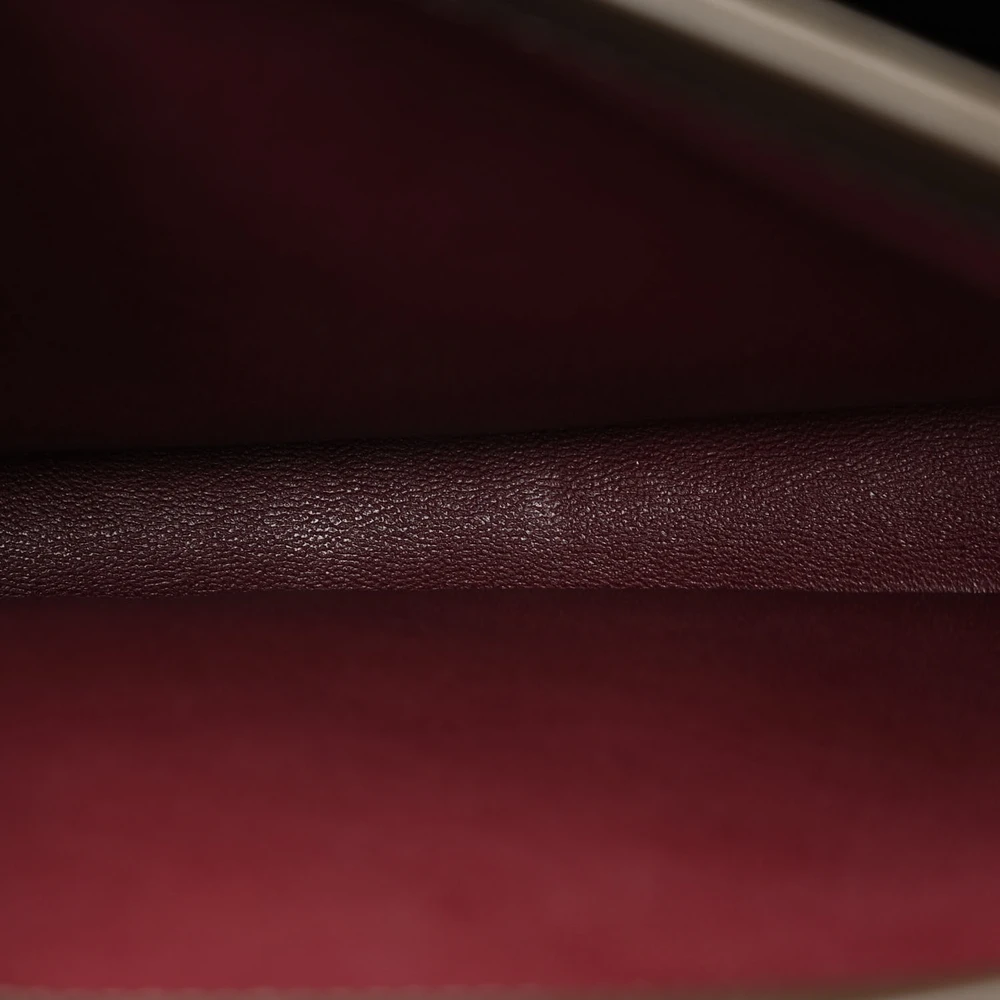 Interior view of the dark khaki quilted lambskin leather Ch@nel Small Trendy CC Flap Dual Handle with organized storage compartments