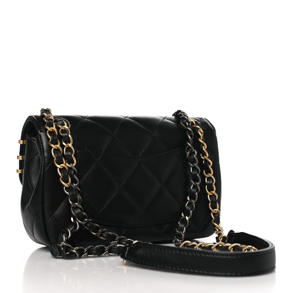 Back view of the black lambskin Ch@nel Mini Coco Clips Flap with decorative metal clips