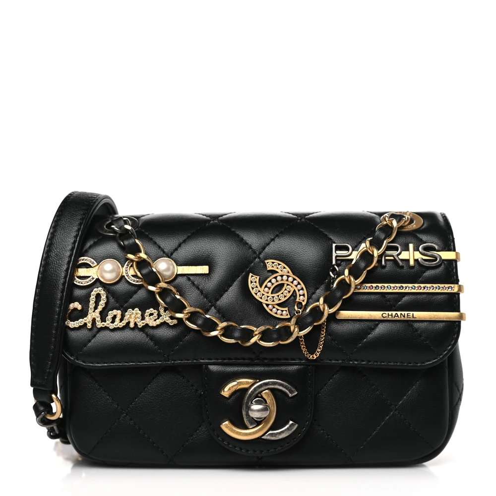 Front view of the black lambskin Ch@nel Mini Coco Clips Flap with decorative metal clips