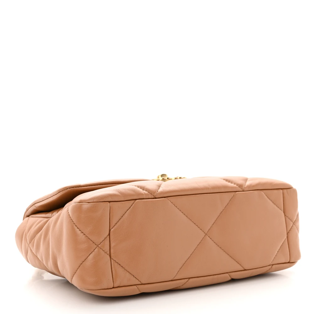 Bottom view of the brown lambskin Ch@nel Medium 19 Flap with mixed aged gold chain strap