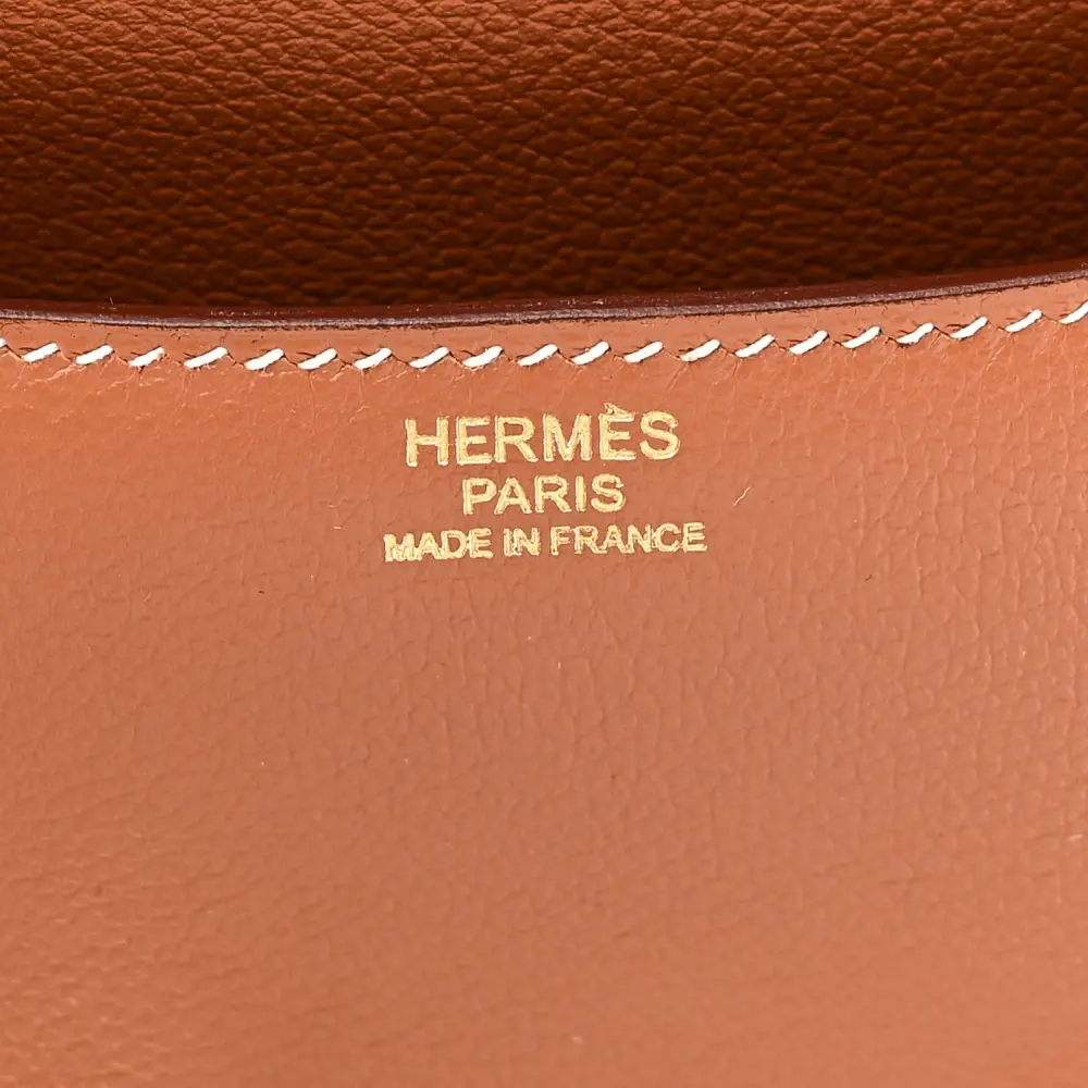 Close-up of the H closure and gold-tone hardware on the brown Evercolor Constance 24