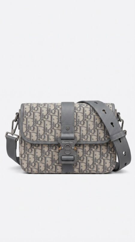 Front view of the D!0r small Saddle Messenger Bag with Oblique jacquard canvas and curved flap