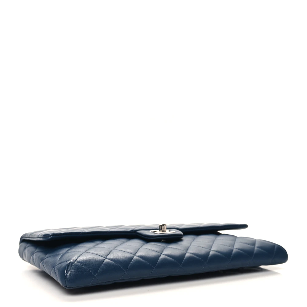 Bottom view of the navy Ch@nel Flap Clutch with Silver-tone CC turn-lock