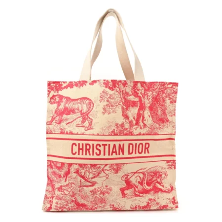 Front view of the beige raffia D!0r Dioriviera Tote with pink pattern