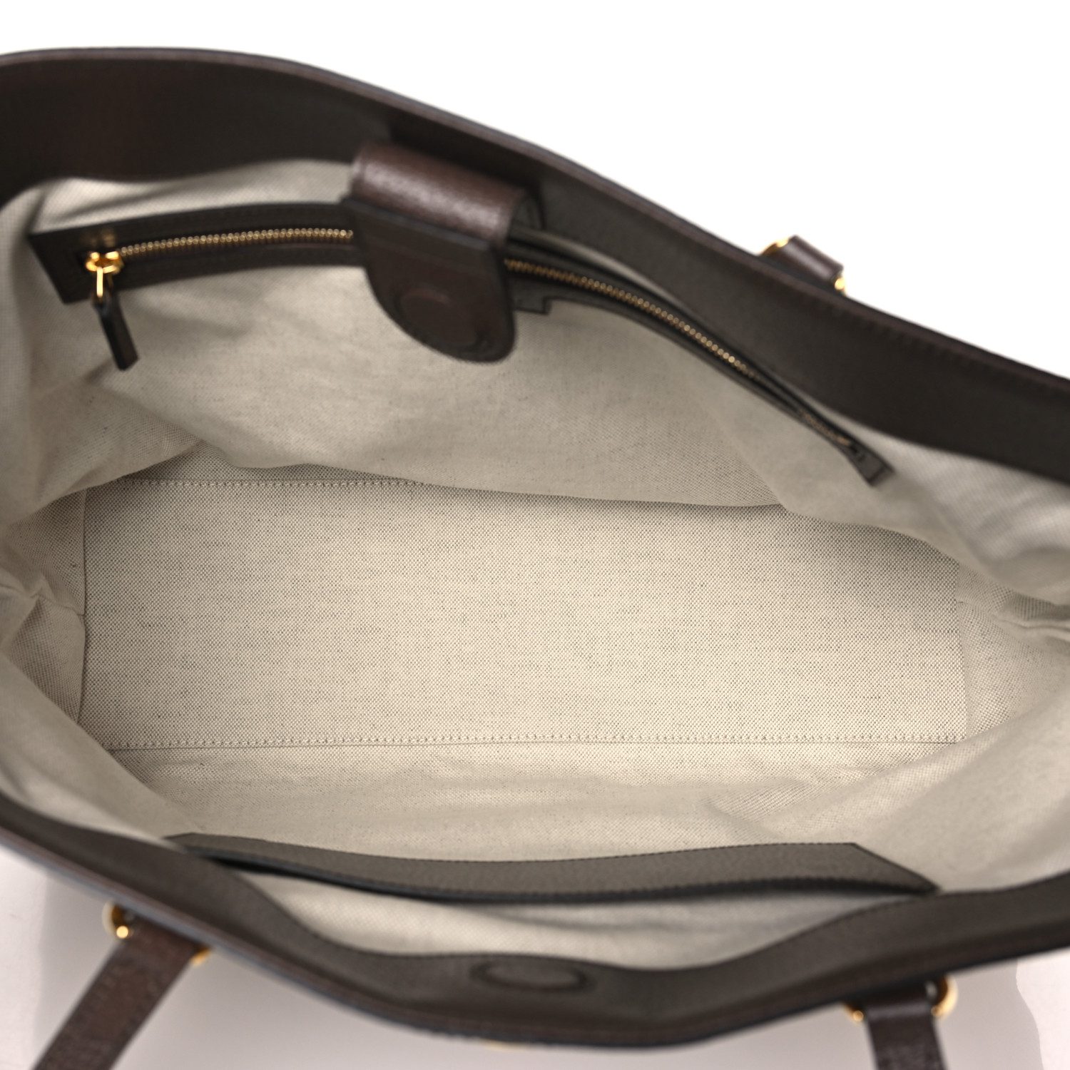 Interior view of the spacious camel and ebony Gucc! Ophidia Shopping Tote