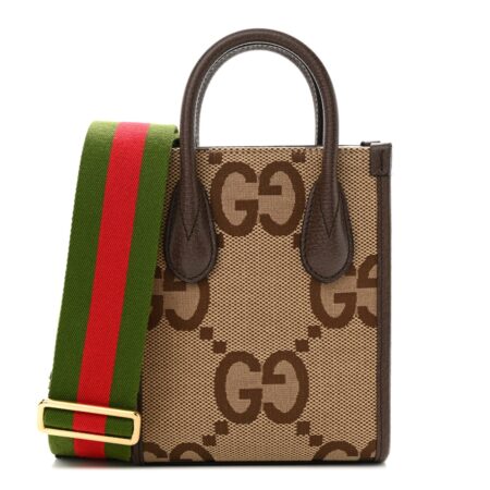 Front view of the beige and ebony Gucc! Jumbo GG Mini Vertical Tote