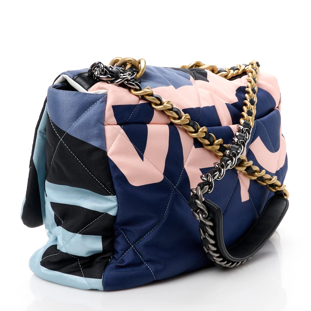 Back view of the Ch@nel Maxi Scarf Flap Bag in black, blue, and white patterned silk with chain strap