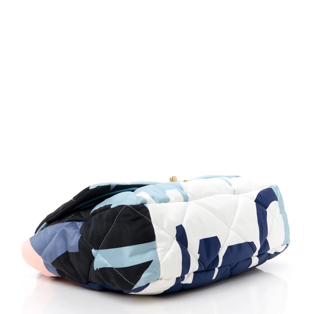 Bottom view of the Ch@nel Maxi Scarf Flap Bag in black, blue, and white patterned silk with chain strap