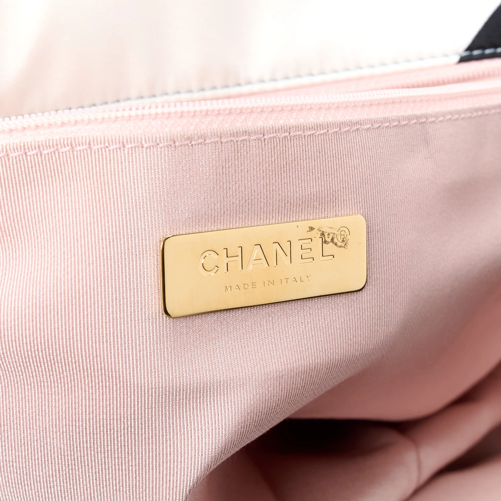 Close-up of the CC turn-lock and mixed-metal chain hardware on the Ch@nel Maxi Scarf Flap Bag