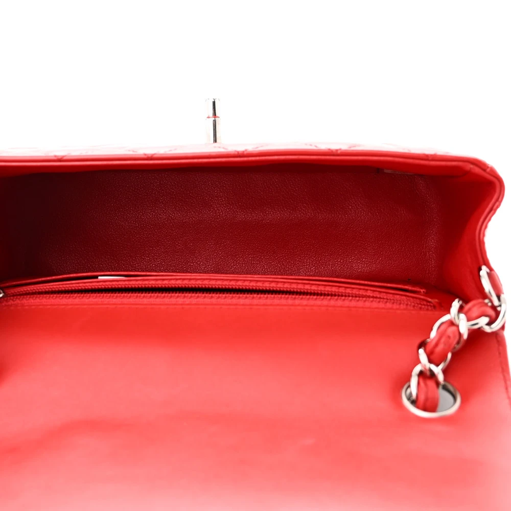 Interior view of the Ch@nel Mini Rectangular Flap showing the black leather lining, zipper pocket, and patch pockets
