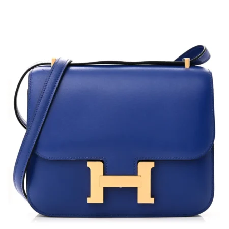 Front view of the Bleu Electrique Herme$ Constance 18 in Tadelakt calf leather