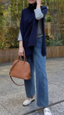 Model carrying the brown Evercolor Herme$ Mini 1923 Bolide