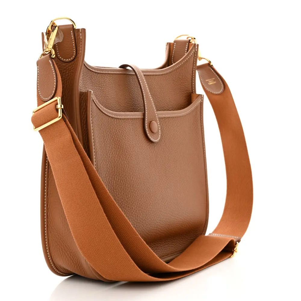 Back view of the brown Taurillon Clemence Herme$ Evelyne III PM