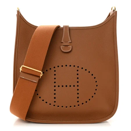 Front view of the brown Taurillon Clemence Herme$ Evelyne III PM