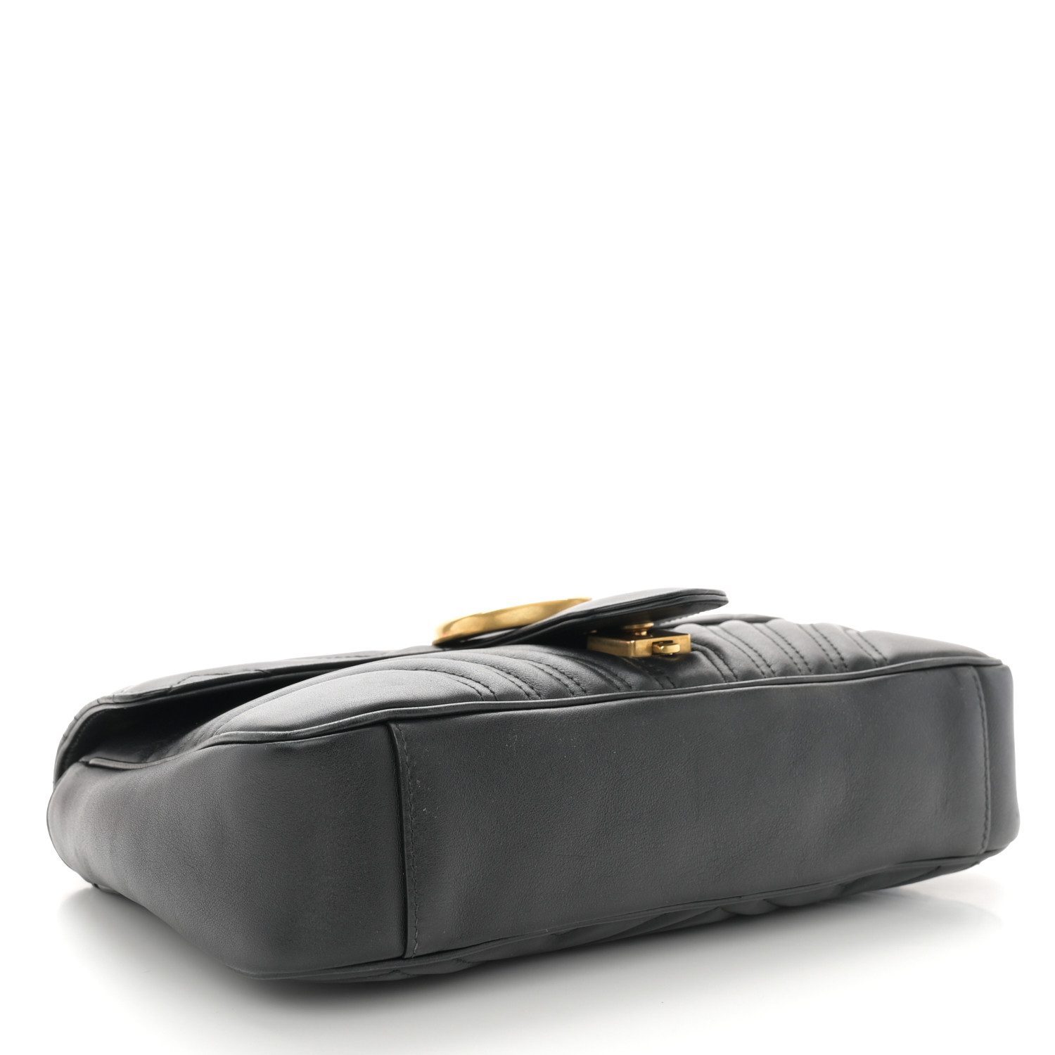 Bottom view of the black calfskin Gucc! Medium GG Marmont Shoulder Bag with iconic chevron quilting