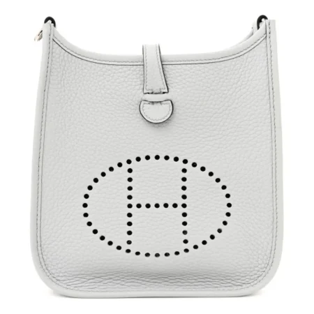 Front view of the Bleu Pale and Etain Herme$ Evelyne TPM messenger bag