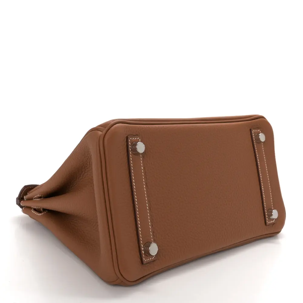 Bottom view of the Brown Togo Herme$ Birkin 25 with rolled leather handles and front flap