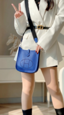 Model carrying the Bleu Electrique and Bleu Indigo Herme$ Evelyne TPM