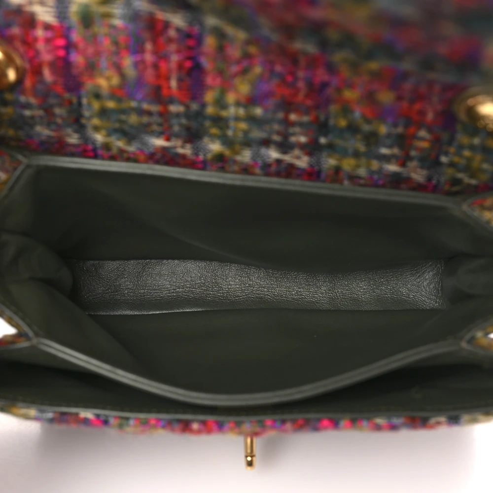 Interior view of the Ch@nel Small Flap Bag showing the olive green leather-style lining and zipper pocket